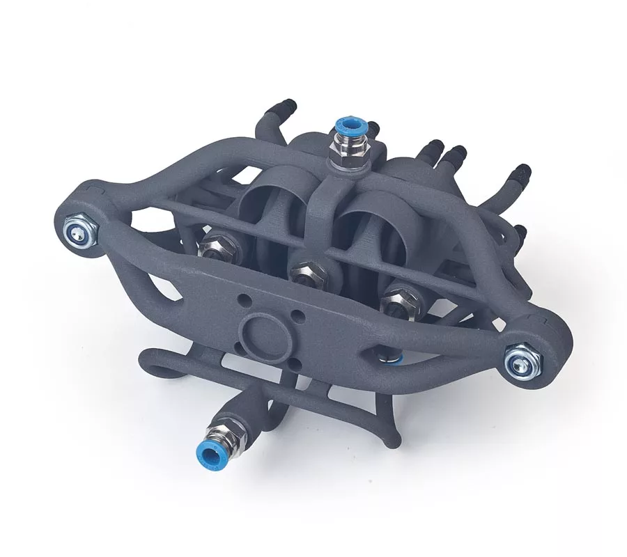 Additiv gefertigter Spreizkopf für eine Verpackungsmaschine